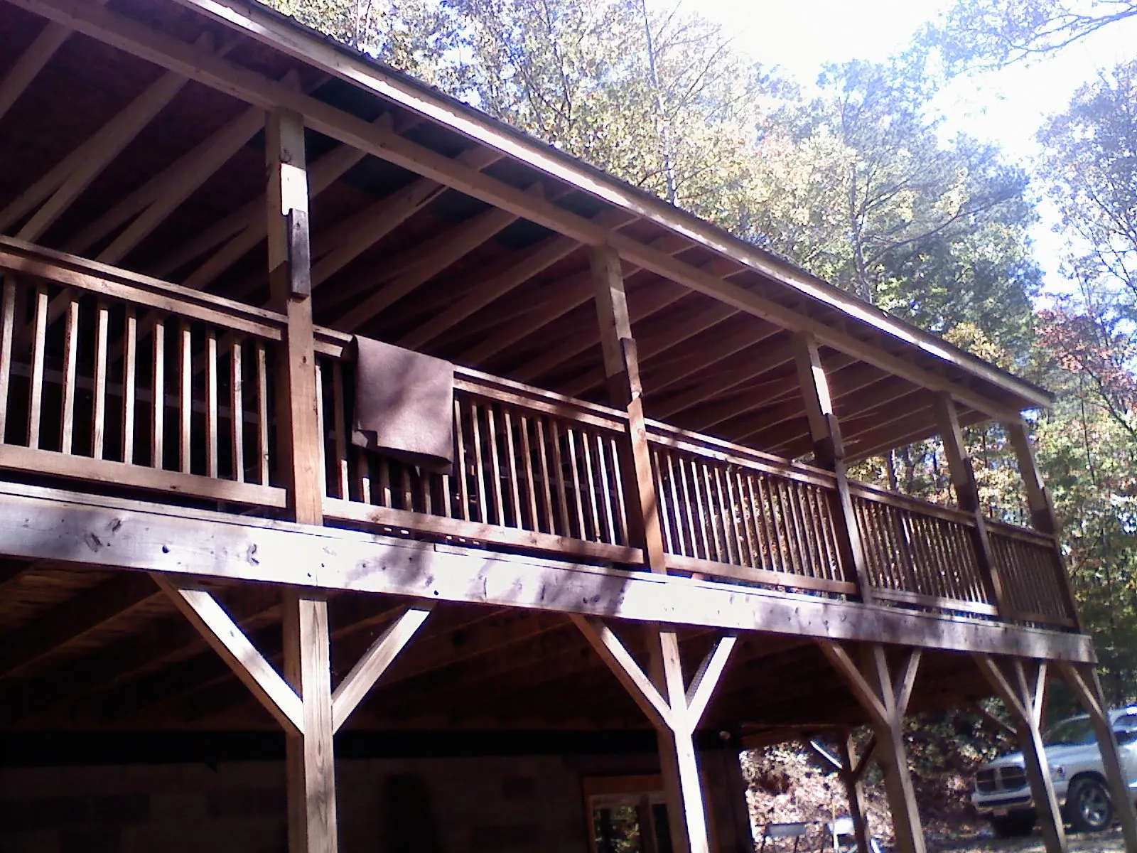 Timber framing under a new elevated porch and deck — Roof Leak Repair in Sanger by Roofing Brothers